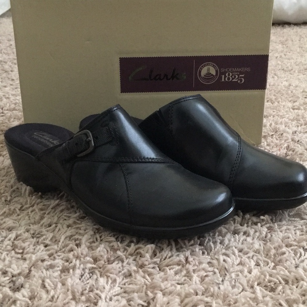 Clark’s woman’s slip on shoes , black leather, new